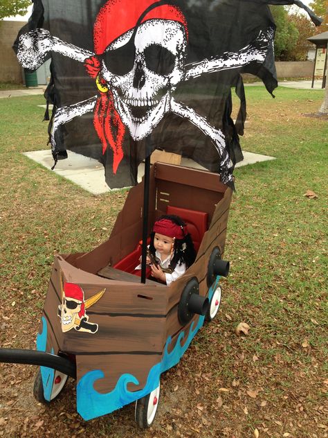 Pirate ship on Radio flyer wagon Wagon Halloween Costumes, Wagon Floats, Pirate Costume Diy, Wagon Ideas, Pirate Boats, Pirate Halloween Costumes, Pirate Theme Party, Pirate Halloween, Pirate Birthday Party