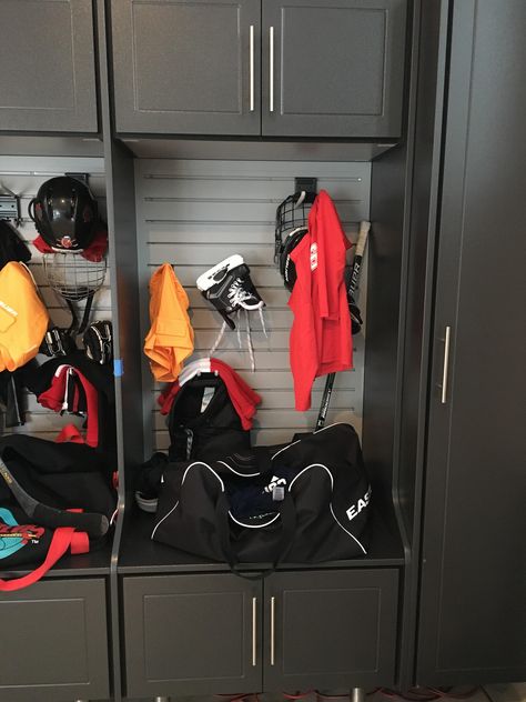 Hockey Gear Storage, Gear Room Ideas, Sport Organization, Slatwall Garage, Slat Wall Storage, Hockey Storage, Garage Lockers, Hockey Diy, Garage Organizing