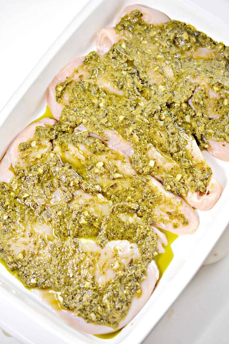 Spinach Artichoke Chicken Bake, Artichoke Chicken Bake, Artichoke Pesto, Chicken Bake Recipe, Chicken Artichoke, Pesto Spinach, Baked Pesto Chicken, Spinach Artichoke Chicken, Raw Spinach