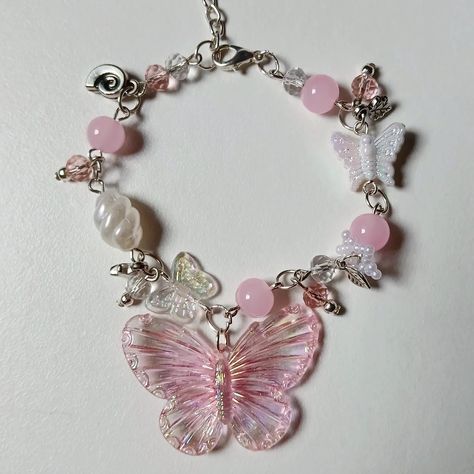 Butterfly Coquette Bracelet🦋✨️ Color Options: pink, pearl white. Price: 130₹ + shipping. Customization available🥀✨️ #bracelet #handmade #handmadejewelry #smallbusiness #connection #communitylove #favaudience #instaengagement #jewelsknot #aesthetic #ａｅｓｔｈｅｔｉｃ #inpiration Coquette Bracelet, Butterfly Bracelet, Bracelet Ideas, Aesthetic Aesthetic, Pink Pearl, Bracelet Handmade, Pearl White, Dream Life, Color Options