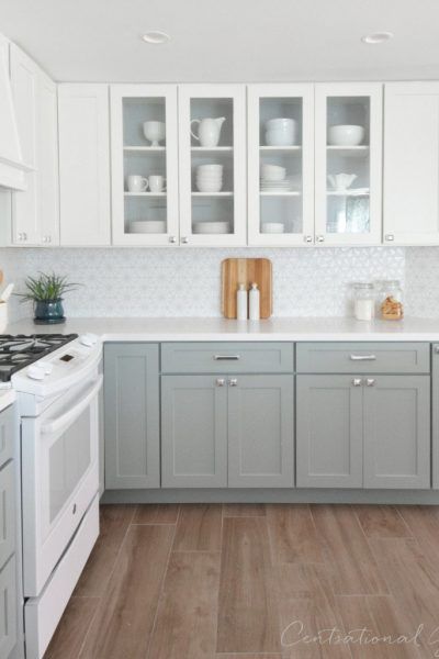 CliqStudios cabinets in Dayton Painted White and Painted Harbor gray are the perfect timeless choice in a kitchen makeover by blogger Kate Riley of CentsationalGirl.com Серая Кухня, Diy Kitchen Countertops, Gray And White Kitchen, Diy Kitchen Renovation, Gray Cabinets, White Appliances, Kitchen White, New Kitchen Cabinets, Kitchen Cabinets Makeover