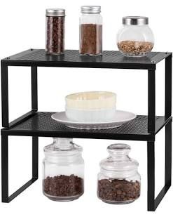 7 Shelf Risers That Will Make Your Cabinets Orderly | Epicurious Shelf Riser, Counter Shelf, Kitchen Shelves Organization, Cupboard Shelves, Shelf Organizer, Spice Bottles, Large Shelves, Kitchen Shelf, Kitchen Cabinet Organization