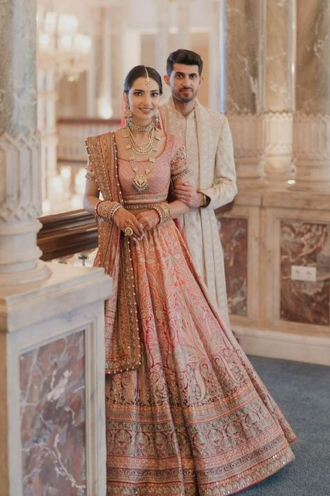 If you're really looking for some traditional craftsmanship and an eye for extreme detailing, you must opt for the Tarun Tahiliani collection. Be it adding sparkling little crystals and Swarovski to your lehenga or giving an ombre effect Tarun knows how to play with patterns and textures. Stalking his Instagram for hours and hours (Totally swooning over this collection!) We curated a list of the best Tarun Tahiliani lehengas that are breathtaking and totally stunning! Tarun Tahiliani Lehenga Brides, Tarun Tahiliani Lehenga, Tarun Tahiliani Bridal, Latest Bridal Lehenga Designs, Bridal Lehenga Designs, Latest Bridal Lehenga, Shimmery Dress, Couple Dress, Muslim Bride