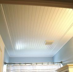 ... the room looks with the beadboard ceiling painted semi-gloss white Installing Beadboard Panels, White Beadboard Walls, Vinyl Beadboard, How To Install Beadboard, Ceiling Painted, Ceiling Remodel, Beadboard Bathroom, Wood Plank Ceiling, Pvc Ceiling Design