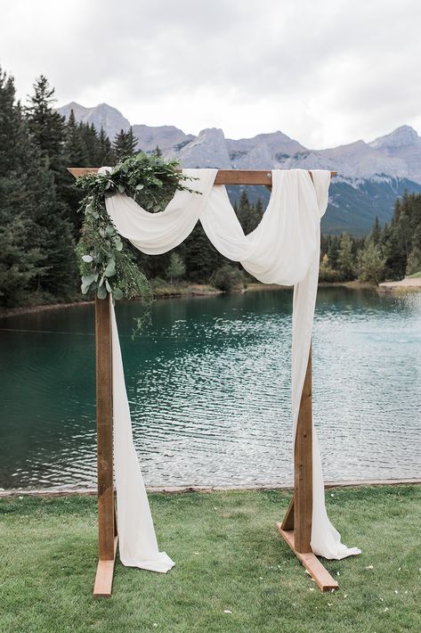 Wedding Arch Ideas Forest, Arch With Greenery Wedding, Eucalyptus Wedding Arch Simple, Emerald Green Arch Wedding, Green Wedding Arch Outdoor Ceremony, Diy Fall Wedding Arch, Wooden Ceremony Arch, Wedding Arch Without Flowers, Simple Ceremony Backdrop