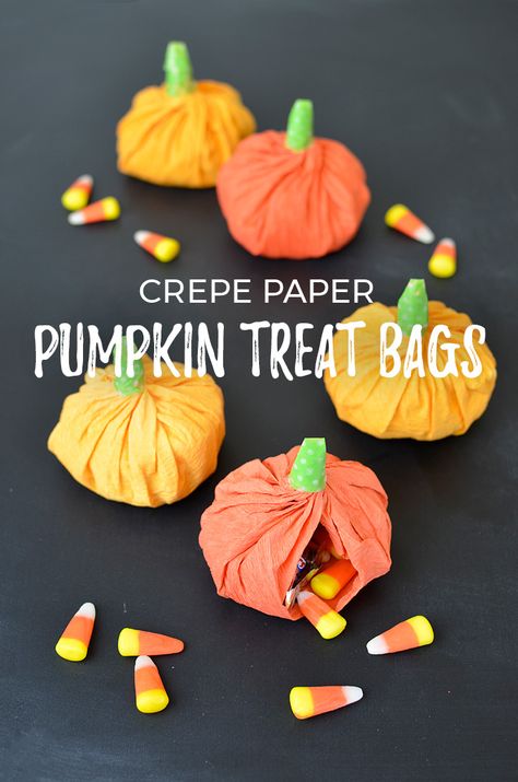 Easy crepe paper pumpkin treat bags - These are perfect for Halloween classroom treats, trick-or-treaters, or party favors! | Just Artifacts Crepe Paper Pumpkins, Tissue Paper Pumpkins With Candy, Diy Halloween Trick Or Treat Paper Bags, Spooky Treats Paper Pumpkin, Pumpkin Treat Bags, Halloween Crepe Paper, Trick Or Treat Candy Bags, Halloween Classroom Treats, Pumpkin Favors