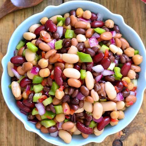 This 5 Bean Salad is a delicious twist on a classic! It combines five different types of beans with bell peppers, pimentos, and red onion in a delicious side dish that's perfect for picnics or potlucks. Best of all, it comes together in just 10 minutes! Easy Three Bean Salad, Best Bean Salad Recipe, Healthy Bean Salad Recipes, 4 Bean Salad Recipe, Dense Bean Salad Recipes, 5 Bean Salad Recipe, Best Bean Salad, Corn Bean Salad, 4 Bean Salad