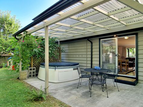 Need to make my patio cover this nice.  Even with the same plastic corrugated sheets, mine looks outdated. Corrugated Plastic Roofing, Patio Trellis, Covered Patio Design, Corrugated Roofing, Pergola Attached To House, Patio Cover, Backyard Pergola, Pergola With Roof, Covered Pergola