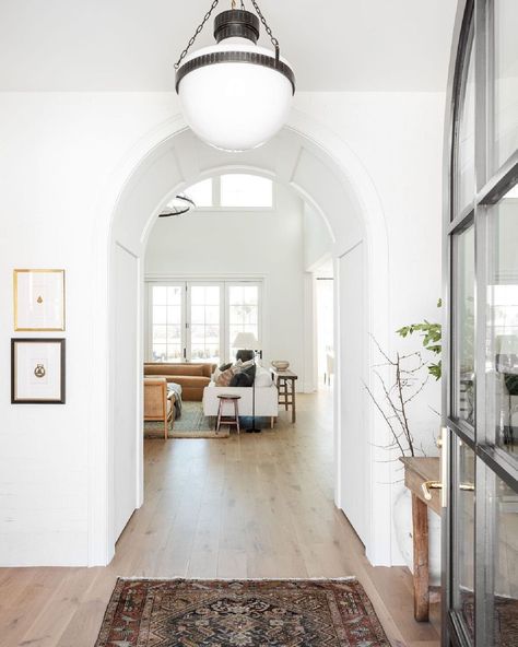 Studio McGee on Instagram: “We've got a thing for arches! ❤️ Sharing some basement progess (and even more arches) on the blog today! 📷: @lucycall” Mcgee Entryway, The Mcgee Home, Mcgee Home, School House Lighting, Studio Mcgee, A Living Room, Home Studio, Design Branding, White Walls