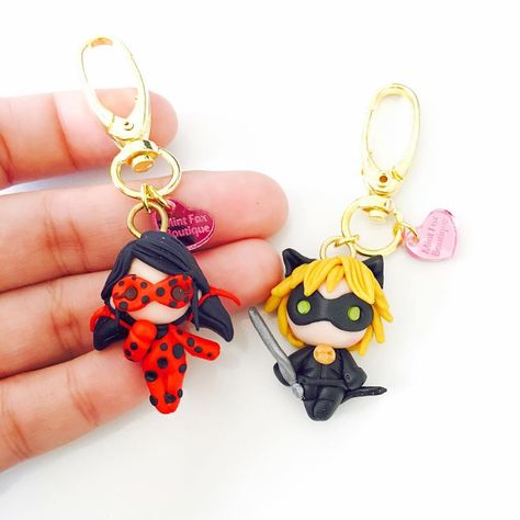 Tiki! Spots on!  Miraculous Ladybug and Cat Noir are available in my shop! They're too cute!! I think I'm gonna keep a set for myself XD… Miraculous Ladybug And Cat Noir, Miraculous Ladybug Toys, Anna Und Elsa, Ladybug Crafts, Clay Keychain, Ladybug And Cat Noir, Ladybug Wallpaper, Ladybug Birthday, Ladybug Party