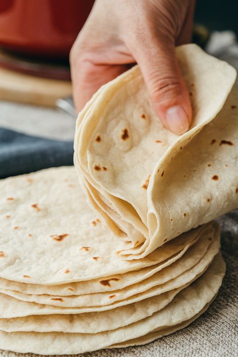 Soft, pliable, and sturdy, these homemade flour tortillas are perfect for tacos, burritos, enchiladas, and more! 🥙✨ Made with just 5 simple ingredients, they’re easy to whip up in under an hour. Whether you use a stand mixer or mix by hand, you’ll love how fresh and delicious these tortillas taste. 🌮 #FlourTortillas #HomemadeTortillas #MexicanRecipes #EasyRecipes #TacoTuesday #FromScratch Easy Flour Tortillas, Soft Tortilla Recipe, Loaded Deviled Eggs, Enchiladas Burritos, Tortillas From Scratch, Homemade Flour, Recipes With Flour Tortillas, How To Make Tortillas, Homemade Flour Tortillas