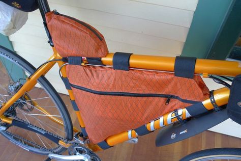 This is the first in a series of posts about the bike I’ll be riding in this year’s Tour Divide, and the gear I’ll bring along. Folks have been bike touring ever since the inventi… Frame Bag Pattern, Bike Riding Outfit, Bike Diy, Bike Frame Bag, Bikepacking Gear, Bike Bags, Biking Diy, Bike Camping, Cycling Touring