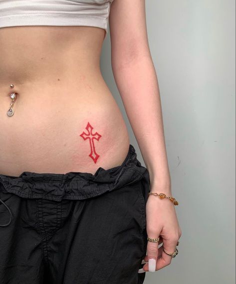 Cute Small Y2k Tattoos, Tiny Tattoos Waist, Cross On Stomach Tattoo, Lower Back Tattoos For Women Words, Lower Waist Tattoos For Women, Cross Stomach Tattoo, Low Waist Tattoos For Women, Waist Line Tattoos For Women, Red Minimalist Tattoo