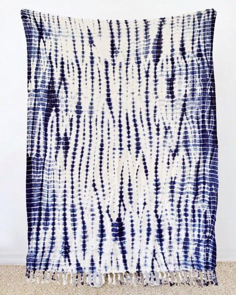 Pretty as a picnic. Each throw is hand-dyed using an ancient Japanese technique, making every piece truly one of a kind. 🌿💙⁠ ⁠⁠ #shibori #handmade #cozyhome #beachthrow #picnicstyle #homedecor #handdyed #japanesetechnique #shiboritiedye #shiboridesign #shiborilove #japaneseshibori #indigodye #shiboripattern #shiboricraft #shiborieveryday #shiboriartist #textileart Picnic Style, Indigo Shibori, White Cloth, Organic Pattern, Cozy Night, Indigo Dye, A Picnic, Shibori, Tie Dye Top