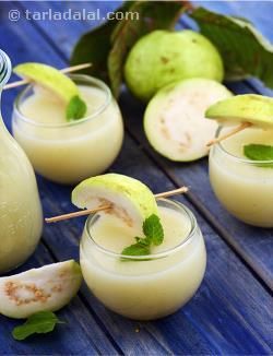 A mouth-watering blend of guava puree, ginger and lemon juice, garnished with sprigs of mint that add an irresistible aroma and flavour to the Guava Punch. Cooking the guava helps to soften it before pureeing, while straining this mixture helps remove the guava seeds that might spoil the rich and creamy mouth feel of this drink. Pungent ginger and tangy lemon help to both enhance and balance the natural sweetness of guava very pleasantly. Guava Punch, Breakfast For Him, Guava Puree, Guava Drink, Juicing Recipes For Beginners, Guava Recipes, Ginger And Lemon, Birthday Breakfast, Fresh Drinks