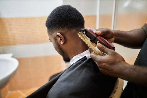 African american hairdresser cuts an afr... | Premium Photo #Freepik #photo #men-haircut #men-salon #salon-barber-shop #hair-cut Clipper Haircut, Men Salon, Black Barber, Photo Men, Conference Poster, Barbers Cut, Company Business Cards, Haircut Men, Men Haircut