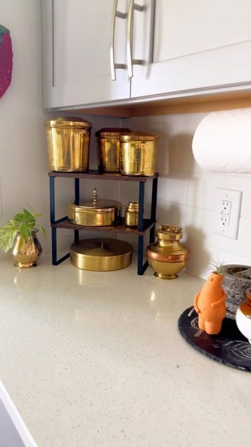 Chandana on Instagram: "Spices refills and organization - if all that could happen in 30 secs 😄 . . . . . . . . . . . . . #indianspices #spicerack #brasscontainers #brassmasalabox #kitchen #kitchendecor #kitchendesign #indiankitchen #indiankitchendecor #kitchengoals #kitchenideas #kitcheninterior #ａｅｓｔｈｅｔｉｃ #homeorganization #kitchenorganization #pantry" Indian Spice Organization Ideas, Indian Spice Organization, Indian Kitchen Organization Ideas, Indian Kitchen Decor, Indian Kitchen, Kitchen Spices, Kitchen Pantry Design, Spice Organization, Indian Home