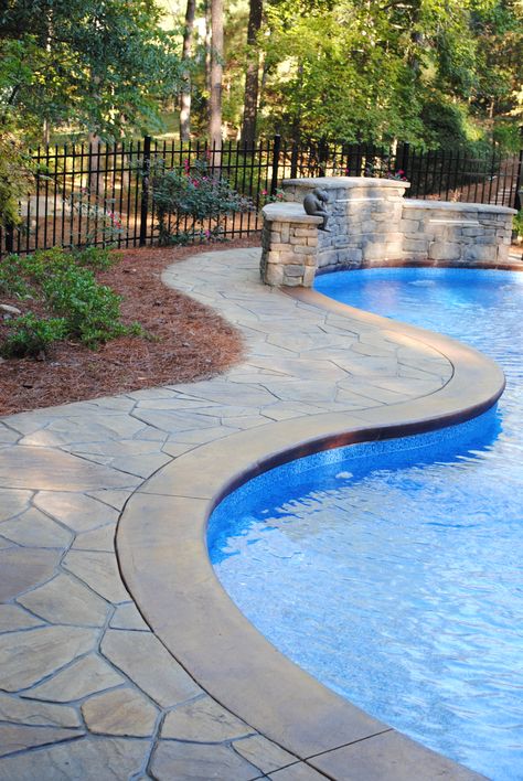 Stamped Concrete; Flagstone Pattern with Stained Concrete Border Swimming Pool Border Ideas, Concrete Pool Coping Ideas, Pool Stamped Concrete Ideas, Stamped Flagstone Concrete Patio, Stamped Concrete Around Pool Ideas, Pool Concrete Ideas, Pool Patio Stamped Concrete, Inground Pool With Stamped Concrete, Inground Pool Stamped Concrete