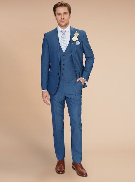 New lounge suits in sharp silhouettes and key shades of blue are the new way to do formal for those that like to take dressing up down a notch. Groomsmen Attire Grey, Blue Wedding Suit Groom, Groom Suit Navy, Best Wedding Suits, Summer Suits Men, Blue Suit Men, Moss Bros, Blue Lounge, Blue Suit Wedding