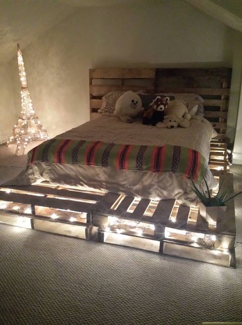 DIY pallet board bed frame and headboard idea. Used 10 pallet boards total for queen size mattress free from a restaurant (8 on bottom 2 as headboard). 3 packs of lights from ikea, $8 per pack strung through the pallets. Wooden Pallet Beds, Pallet Bed Frame, Pallet Furniture Plans, Diy Pallet Bed, Pallet Beds, Pallet Bed, Wooden Pallet Furniture, Pallet Sofa, Bed Headboard