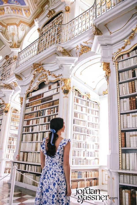 Travel Blogger Jordan Gassner posing as Belle from Beauty in the Beast in front of a bookshelf at Admont Abbey in Austria Halstatt Austria, Austria Itinerary, Austria Hallstatt, Interrail Europe, Castles In Germany, Austria Travel Guide, Vienna Travel, Hallstatt Austria, Graz Austria