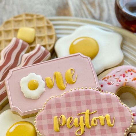 BELLA’S Perfections on Instagram: "Brunch anyONE is an adorable theme for a 1st birthday celebration.

#birthdaycookie #birthdaycookieset #brunchforone #brunchcookie #birthdaygirl #decoratedsugarcookie #denvillenj #royalicingtransfers #wafflecookie #eggcookie #breakfastcookie #breakfast #sugarcookies #donuts #donutcookies" Pancakes And Pajamas Cookies, Breakfast First Birthday Party, Brunch Anyone First Birthday, Brunch First Birthday, Breakfast Themed Birthday Party, Bday Breakfast, First Birthday Brunch, Breakfast Brunch Party, Bday Brunch