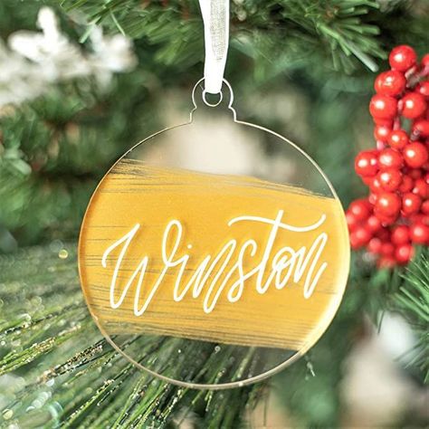 Celebrate the holiday season with these adorable acrylic Christmas ornaments. Hexagon Diy, Oil Based Markers, Bell Lamp, Xmas Baubles, Holiday Tags, Family Names, Acrylic Cake Topper, Christmas Bauble, Baby's First Christmas