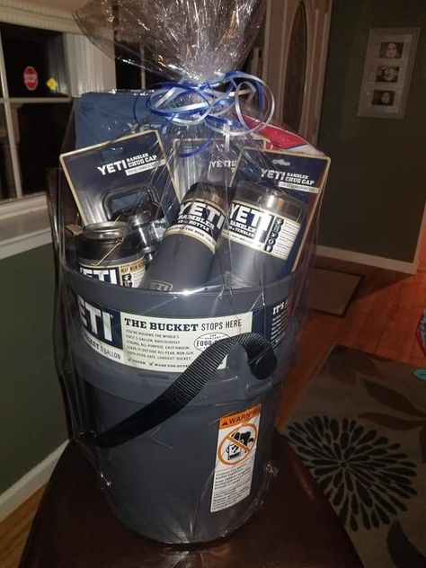 Yeti Gift Basket Ideas, Yeti Cooler Gift Basket, Yeti Gift Basket, Gift Basket Ideas For Him, Cooler Gift Basket, Gift Basket Christmas, Bucket Gifts, Basket Christmas, Cooler Gift