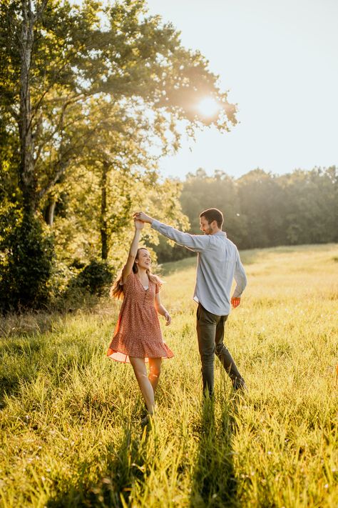 Engagement and couple photos poses and inspiration. Poses in a field and woods. Field and woods location for engagement pictures. Summer engagement pictures and ideas. Chattanooga, Tennessee. Chickamauga Battlefield. Summer engagement picture locations in the woods and outdoors Twirling Couple Pictures, Tennessee Engagement Pictures, Twirl Engagement Photo, Engagement Field Pictures, Cute Couple Outdoor Pictures, Field Picture Ideas Couple, Couple Poses For Fall Pictures, Engagement Photos Flowy Dress, Cute Outdoor Couple Pics