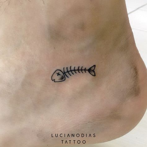 Mini fishbone tattoo made by me at the Black Box Studio. Tiny Bone Tattoo, Fish Stick And Poke Tattoo, Fish Bone Tattoo Simple, Small Bone Tattoo, Fish Skeleton Tattoo Simple, Simple Shin Tattoo, Bonefish Tattoo, Bone Fish Tattoo, Dead Fish Tattoo