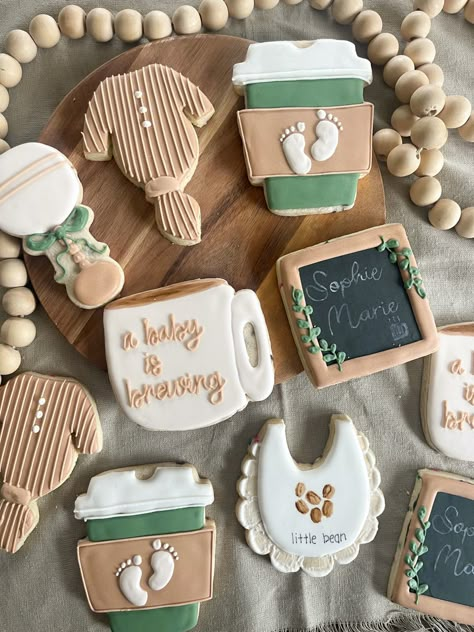 Gender Reveal Coffee Theme, Coffee Themed Party Favors, Bean Baby Shower Ideas, Coffee Baby Shower Cookies, Baby Brewing Coffee Shower Ideas, Coffee Shop Baby Shower Ideas, A Baby Is Brewing Cookies, Baby Shower Coffee Theme, Coffee Baby Shower Theme