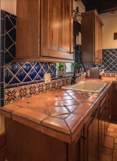 We have created a fabulous decorative tile backsplash with a saltillo counter top. #pradoshandcraftedtilestudio #mexicantileandstone #customtile #saltillotile #kitchendesign #interiordesign #backsplashdesign #countertops #customfloors #azdesigns www.mexicantileandstone.com Hacienda Kitchen Decor, Mexican Tile Kitchen, Mexican Home Design, Mexican Style Kitchens, Hacienda Kitchen, Spanish Style Kitchen, Tile Countertops Kitchen, Spanish Home Decor, Mediterranean Interior