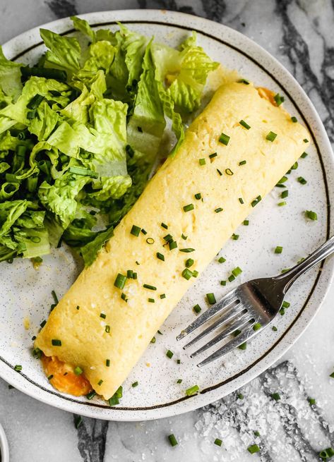 French Omelette {Authentic Recipe with Video!} – WellPlated.com French Omelette, Omelette Recipe, Healthy Eggs, Nicoise Salad, Beet Salad, Authentic Recipes, Angel Food, Omelet, Shredded Cheese