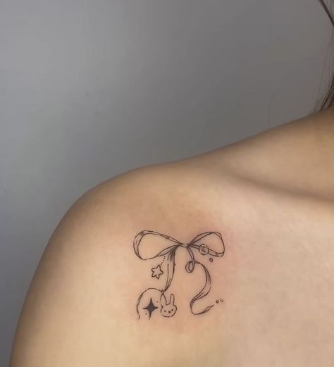 bow tattoo Heart Ribbon Tattoo, Small Shoulder Tattoos, Bunny Tattoos, Ribbon Tattoos, Small Pretty Tattoos, Bow Tattoo, Cute Little Tattoos, Cute Tiny Tattoos, Discreet Tattoos