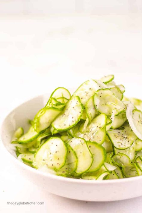 This quick and easy cucumber salad recipe is made with cucumbers, dill, vinegar, sugar, and salad to create a delicious, fresh vinaigrette and the perfect simple side dish. We love adding tomatoes and avocado too! #gayglobetrotter #cucumber #salad #cucumbersalad #cucumbervinegarsalad #saladrecipe #cucumbervinegarsaladrecipe Cucumber Vinegar Salad, Cucumber Vinegar, Cucumber Salad Vinegar, German Cucumber Salad, Vinegar Salad, Easy Cucumber Salad, Side Salad Recipes, Fresh Dishes, Cucumbers And Onions