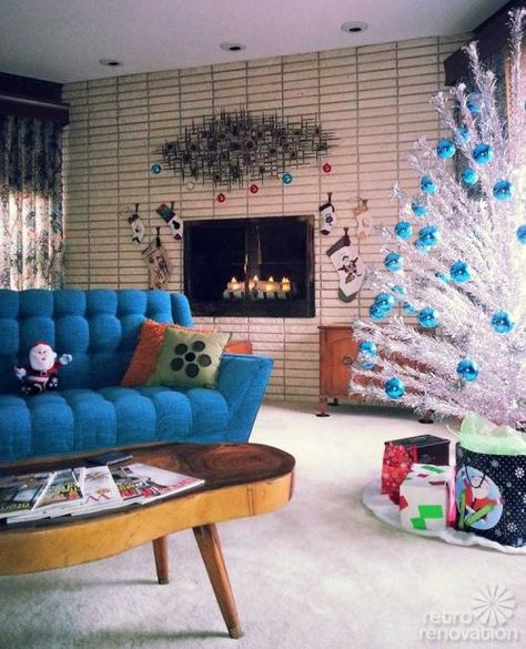 Well, if Eddie can set this up again without electrocuting himself, this is what we will have this Christmas. 60s Christmas Decorations, 60s Christmas, Mcm Christmas, Retro Christmas Decorations, Mid Century Modern Christmas, Aluminum Christmas Tree, White Trees, Blue Lights, Retro Renovation