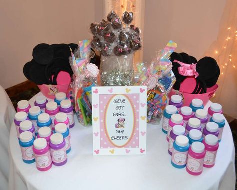 Minnie Mouse First Birthday  | CatchMyParty.com Minnies Bowtique, Bowtique Party, First Birthday Activities, Minnie Boutique, Minnie Mouse Party Favor, Minnie Mouse Birthday Party Ideas, Minnie Mouse Birthday Theme, Minnie Mouse Theme Party, Twodles Birthday