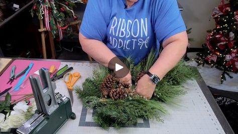 How to Make a Simple Traditional Christmas Teardrop Swag | Join Coach Julie as she makes a gorgeous, yet simple traditional Christmas Teardrop SWAG! 
We love swags, especially around the holidays, y'all!
What do... | By Southern Charm Wreaths | Hey guys welcome back I'm Julie
Somaco owner of Southern Charm Wreaths where we teach you the
art of a wreath making and faux floral designing today I
want to show you how to make a simple teardrop swag for
Christmas so we are going to be taking a swag actually we're
going to be making taking two swags and enhancing it and
making it a little bit more luxurious so this video is just
to keep it simple can I do it I'm going to try it is going to
be a usually I'll tell you to fluff it and shape it and and
get get the the shape right to start designing o Porch Light Swag Diy Christmas, Making A Christmas Swag, Christmas Teardrop Swags Diy, Teardrop Christmas Swag, How To Make A Door Swag, Teardrop Wreath Diy, Mailbox Swag Diy How To Make, Tear Drop Wreath Diy Christmas Swags, Diy Christmas Swags For Front Door