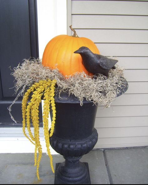 Pumpkins In Urns On Porch, Urn Pumpkin Decor, Fall Urns With Pumpkins, Gothic Front Porch Decor, Halloween Front Porch Planters, Halloween Porch Planter Ideas, Halloween Pots Front Porches, Halloween Porch Planters, Classy Halloween Front Porch