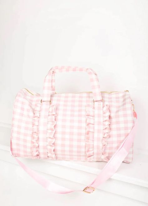 Gingham Ruffle Duffle Bag with Patches. Personalized. 0-2 patches included. An easy choice for a weekender bag, our Ruffle Duffle comfortably holds all of your getaway essentials--like packing cubes, a sweatshirt & Pouches--while still fitting under the seat of airplanes. Perfect to use as a gym bag, travel bag, overnight bag, baby bag, overnight bag for kids, daycare bag and more. Bag With Patches, Daycare Bag, Letter Patches, Holdall Bag, Kids Daycare, Outfits Petite, Sac Week End, Current Fashion, 2022 Trends