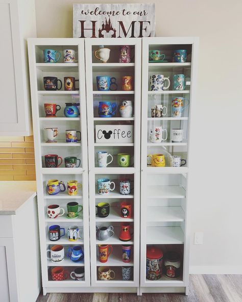 Our Disney mug collection expanded so we’ve added another cabinet. Now we have room for more mugs! Which mugs should we get next? 😍… Mugs Organization, Disney House Ideas, Casa Disney, Deco Disney, Coffee Mug Display, Mug Storage, Disney Room Decor, Disney Mug, Coffee Bar Ideas