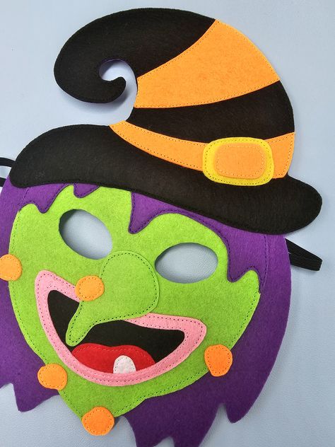 Are you prepared to infuse a hint of mystical charm into your little one's Halloween ensemble? Look no further because today, we're immersing ourselves in an exhilarating DIY project that's perfect for conjuring up with your kids. I am about to guide you through the step-by-step process of crafting an adorable felt witch mask that will ignite your children's enthusiasm to dress up and revel in the Halloween festivities. Witch Mask, Diy Halloween Witch, Felt Witch, Kids Pattern, First Halloween, Diy Mask, Tutorial Diy, Quiet Book, Diy Halloween