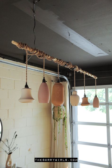 With a little bit of paint and baking soda, we turned thrifted pendant light shades from out of date to a natural boho wonder! This organic boho hanging pendant light is made from upcycled thrift store finds. Learn how to make these using DIY terracotta textured paint by clicking the link now! Boho Pendant Light, Diy Hanging Light, Hanging Bedroom Lights, Terracotta Paint, Boho Lighting, Diy Pendant Light, Baking Powder Uses, Pendant Light Shades, Kitchen Lighting Fixtures