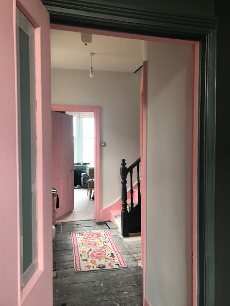 Pink House Helps...in the hallway (and on the stairs)  — The Pink House Pink Door Interior, Pink Bannister, White Walls Pink Trim, Pink Skirting Boards, Pink Trim White Walls, Pink Doors Interior, Pink Hallway Ideas, Fun Hallway, Colourful Hallway