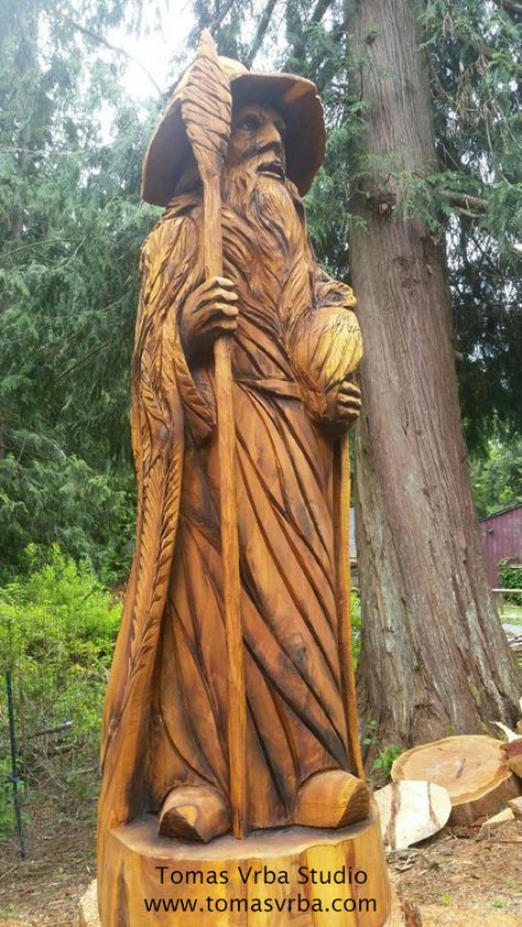 A wise #wizard carved into a #salvagedwood tree stump. #characterdesign #comicon Stump Carving, Carved Tree Stump, Wizard Carving, Chainsaw Carving Patterns, Chainsaw Sculpture, Chainsaw Wood Carving, Wood Sculpture Art, Wooden Man, Tiki Statues