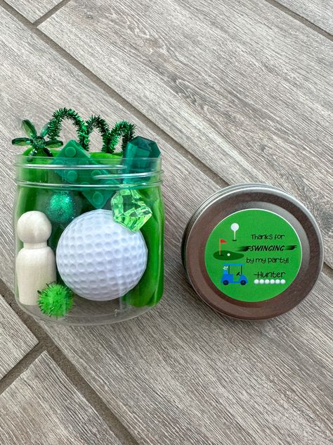 Golf ball and play dough in a jar with other sensory items Top Golf Party Favors, Golf Goodie Bag Ideas, Golf Birthday Party Favors, Goodie Bag Ideas, Personalized Birthday Favors, Playdough Party, Golf Theme Party, Golf Party Favors, Par Tee