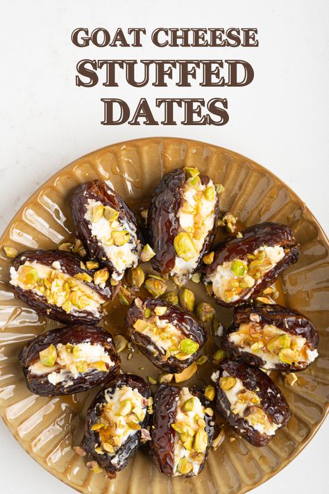 These goat cheese stuffed dates are the perfect sweet and salty appetizer that come together in 15 minutes with 5 ingredients: dates, goat cheese, honey, and pistachios. They can be enjoyed as is or baked in the oven, topped with crushed pistachios, a generous drizzle of hot honey, and fresh herbs. Appetizers With Goat Cheese Appetizer Ideas, Roasted Dates Goat Cheese, Roasted Stuffed Dates With Goat Cheese, Goat Cheese Stuffed Dates With Pistachios, Baked Dates With Goat Cheese, Moroccan Stuffed Dates, Stuffed Dates With Goat Cheese, Pistachio Stuffed Dates, Goat Cheese Dates Appetizer