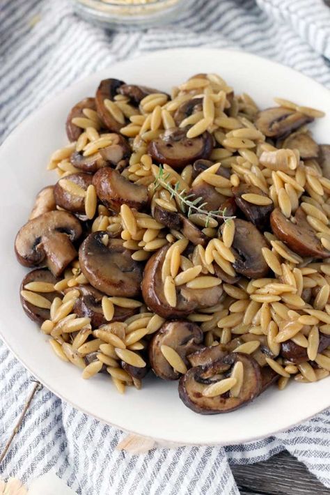 Close up of orzo and mushrooms on a white plate with a sprig of thyme on top Orzo With Mushrooms, One Pot Orzo, Orzo Recipes, Vegetarian Sides, Rachel Ray, Browned Butter, Mushroom Recipes, Biscuit Recipe, Orzo