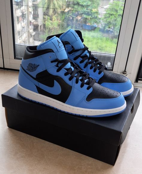 This is the Nike Jordan 1 Mid University Blue/Black variant released this year. Underrated shoe, personally I like this more than the more popular white variant but that's just me... Thoughts? Air Jordan 1 Mid University Blue, Black Jordan 1 Outfit Women, Jordan 1 Mid University Blue, Jordan 1 Low Blue, Nike Jordan Air 1, Jordan 1 Mid Blue, Nike Jordan 1 Low, Nike Jordan 1 Mid, Jordan 1 Outfit Women