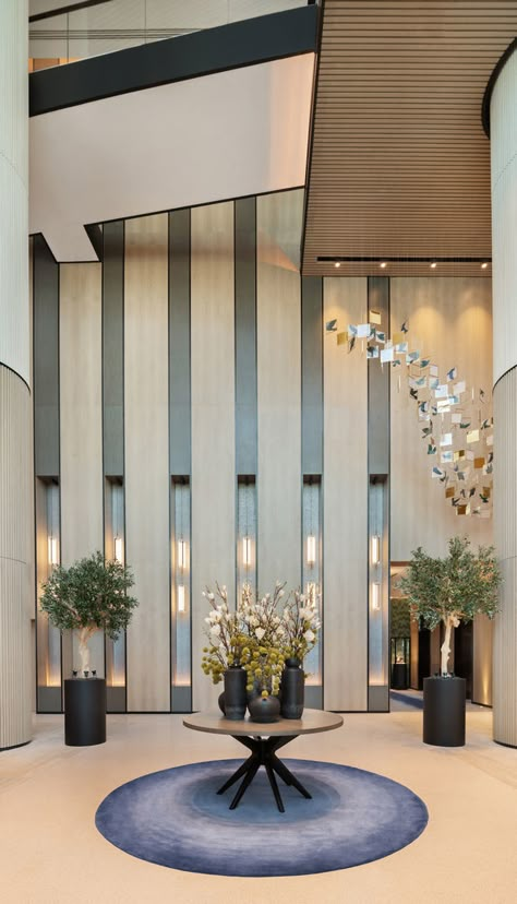 Lulie Fisher's design for new Vida hotel in Dubai features timber columns and pastel furniture - Projects, Hotel Design, Lulie Fisher Design Studio, Vida Hotel, Dubai - CID Pastel Furniture, Hotel Foyer, Tattoo Modern, Hotel Lobby Design, Lobby Interior Design, Hotel Entrance, Column Design, Lobby Interior, Foyer Design